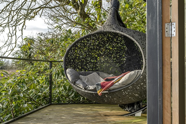 Treehouse stay at Happenoak - love seat overlooking fields and views